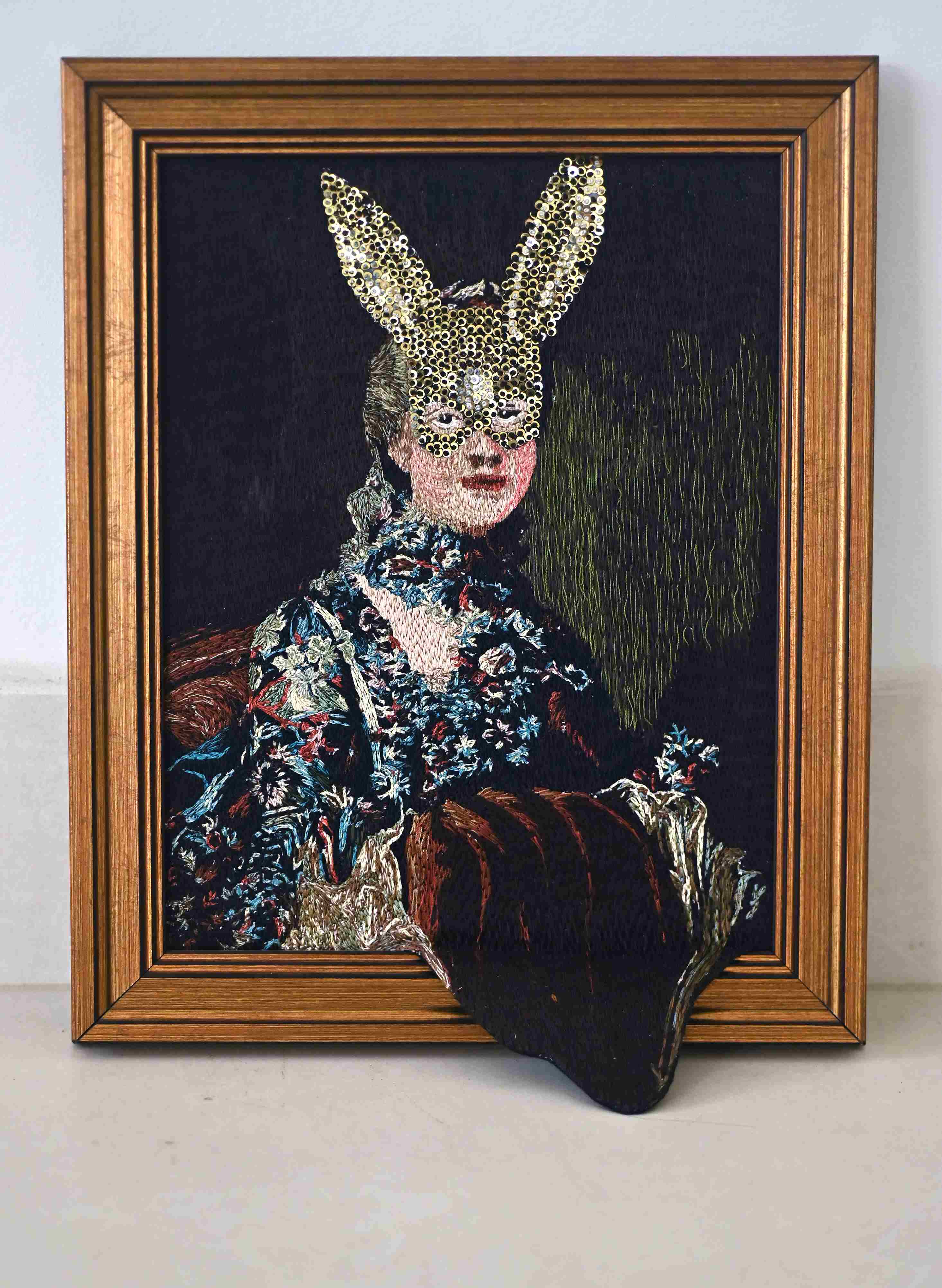Artist: Marium Agha<br>Name: Woman Who Play<br>Medium: Thread on fabric<br> Size: 10 x 15 inches